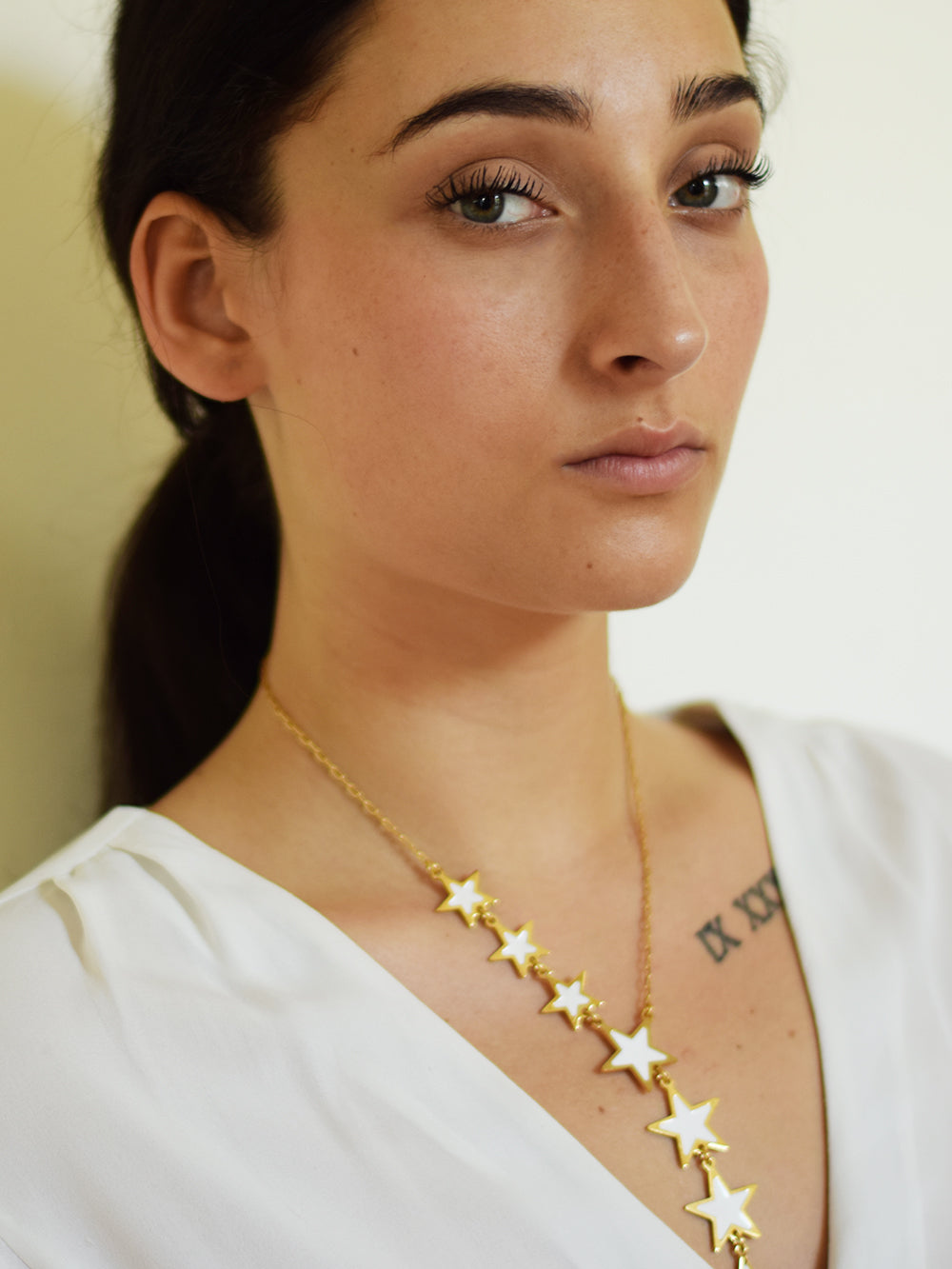 ASIMMETRICAL STAR NECKLACE